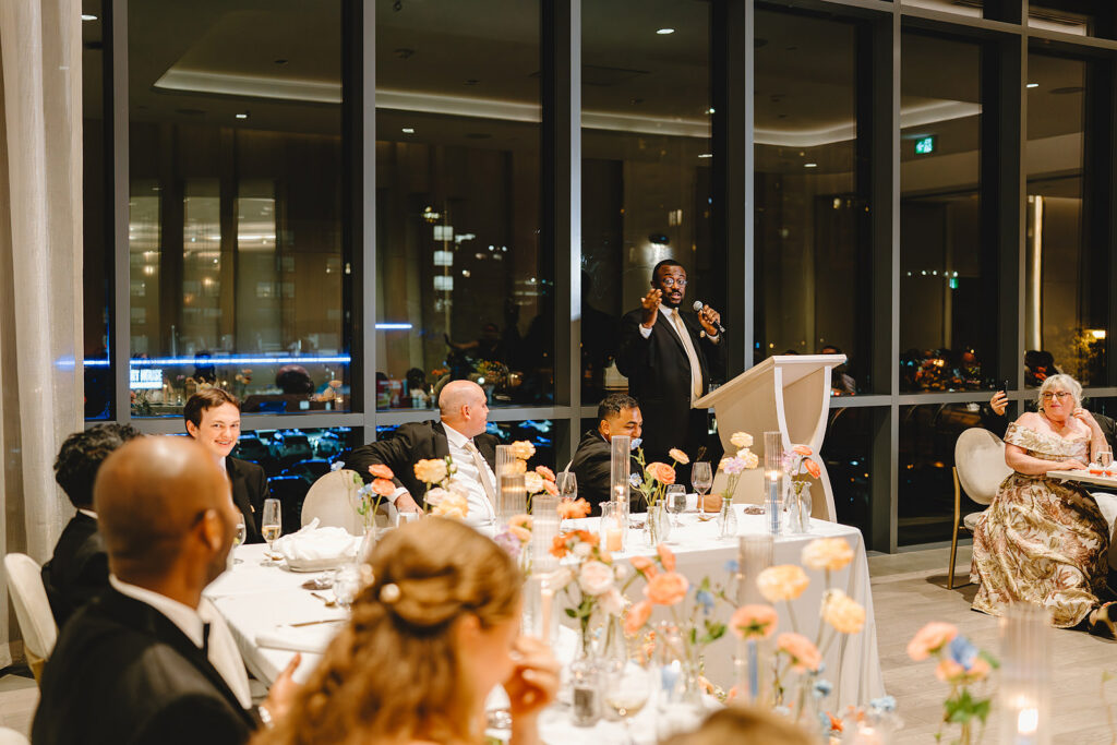 A best man giving a speech at his brothers wedding at The Pearle Hotel