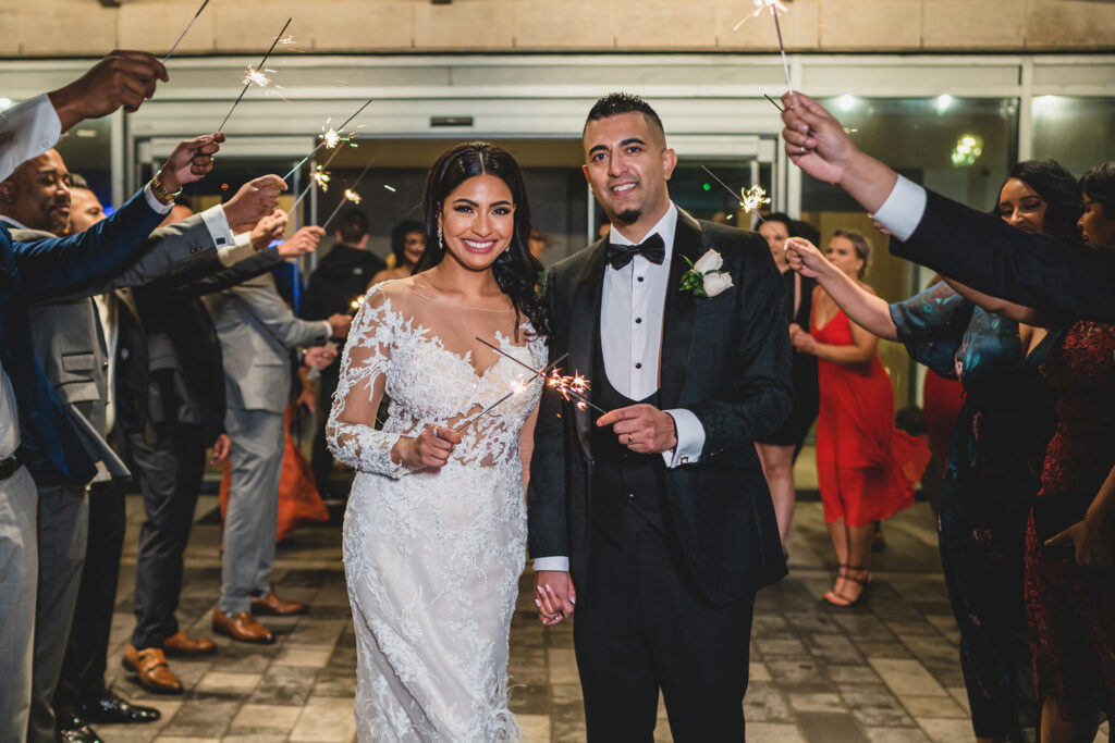 A wedding day sparkler exit at The Pearle Hotel