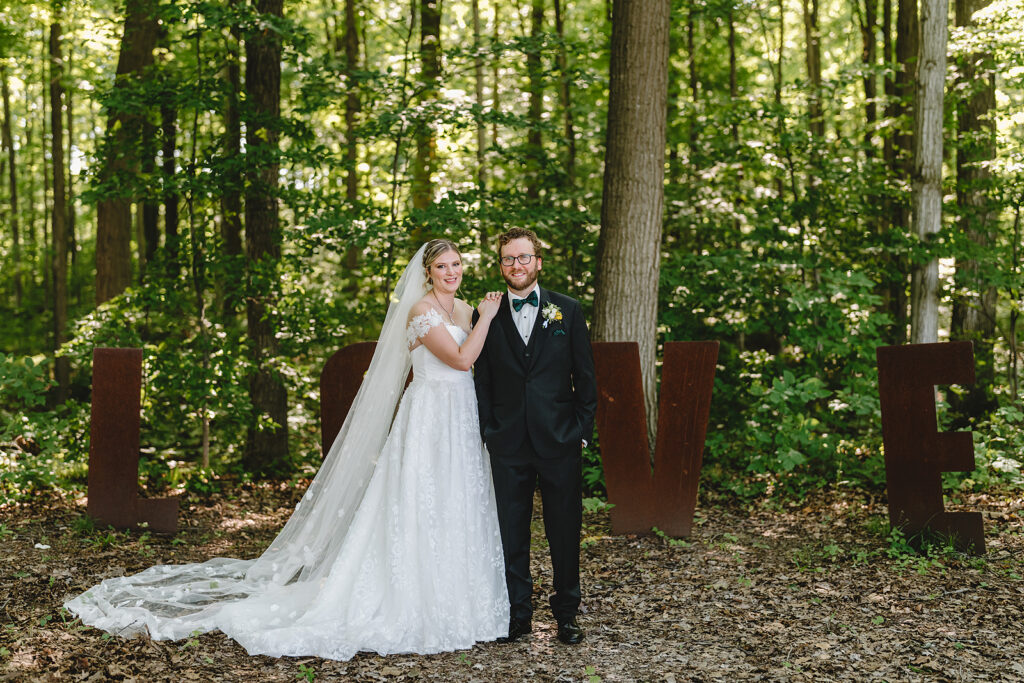 Wedding portraits amongst the trees at whistle bear in cambridge