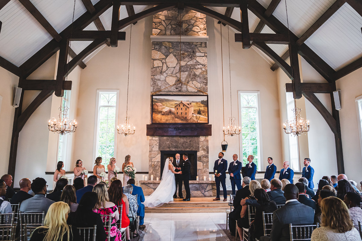 A wedding ceremony inside the indoor chapel at Ancaster Mill