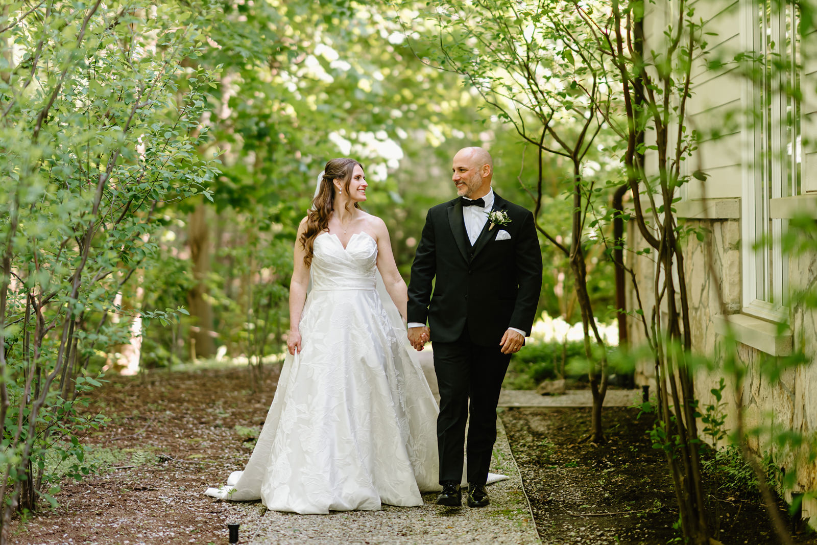 Wedding portrait amongst the trees at Ancaster Mill, in Ancaster