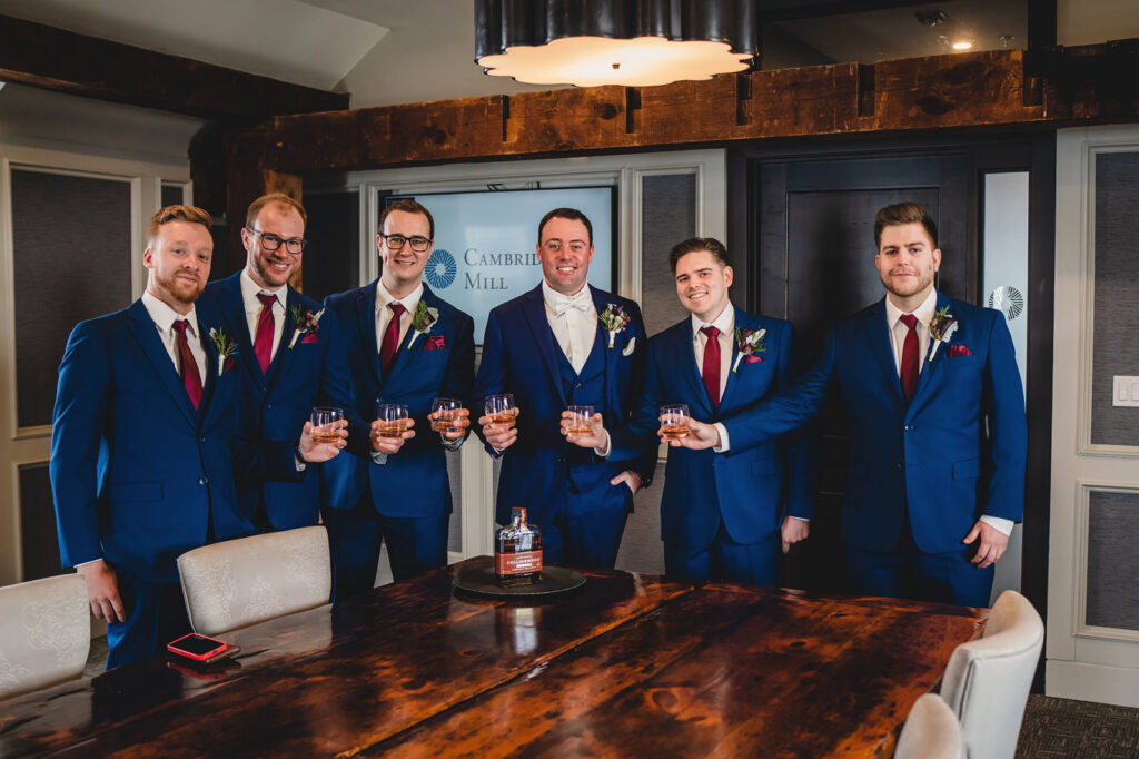 A Groom a Groomsmen having a drink at Cambridge Mill