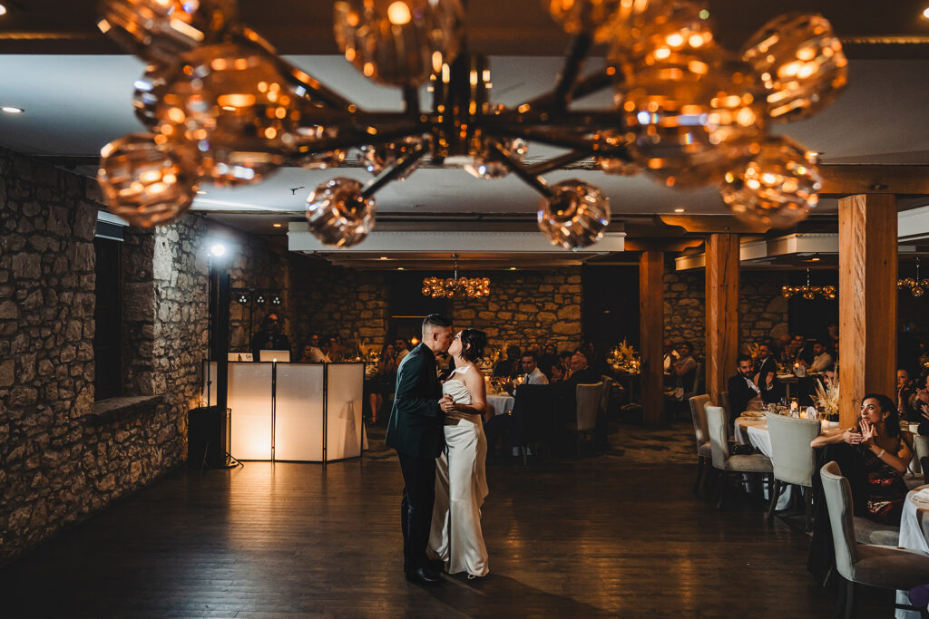 newlyweds sharing their first dance at Cambridge Mill