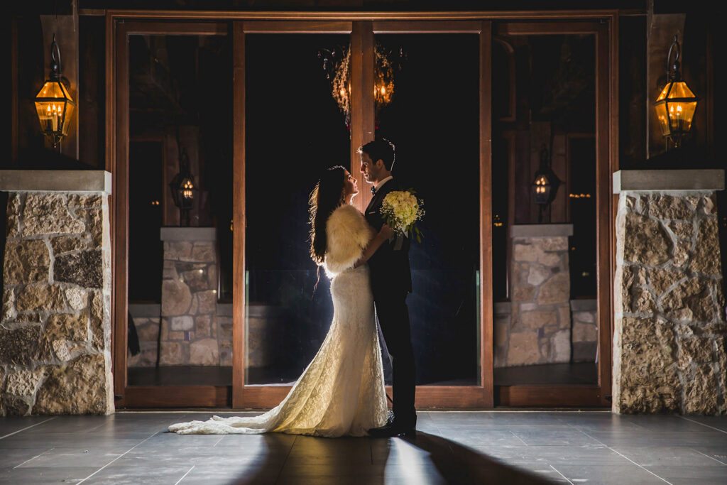 Newlyweds in the chapel at Cambridge Mill for a night time photo