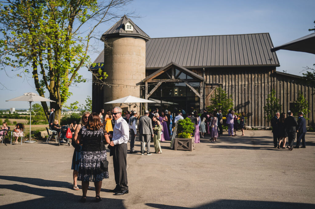 Guests entering the barn at The Earth to Table Farm wedding venue