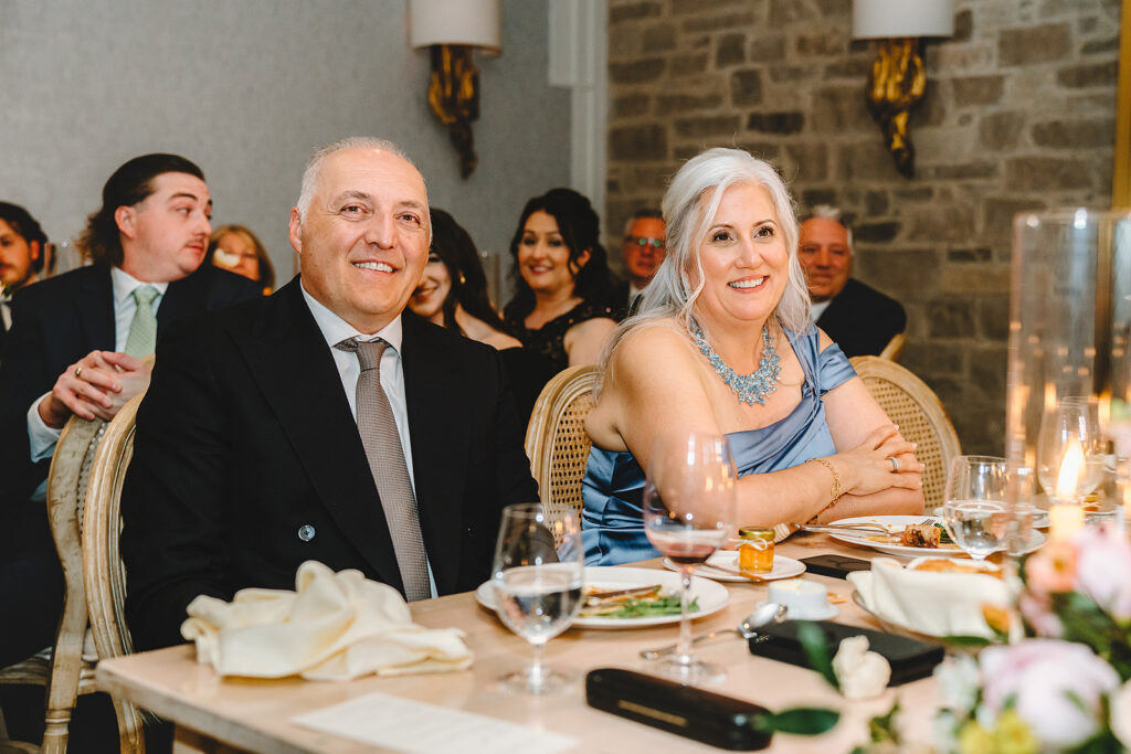 Guests reacting during speeches at Elora Mill