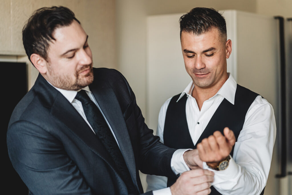A groom getting ready for his wedding at Spencer's at the Waterfront
