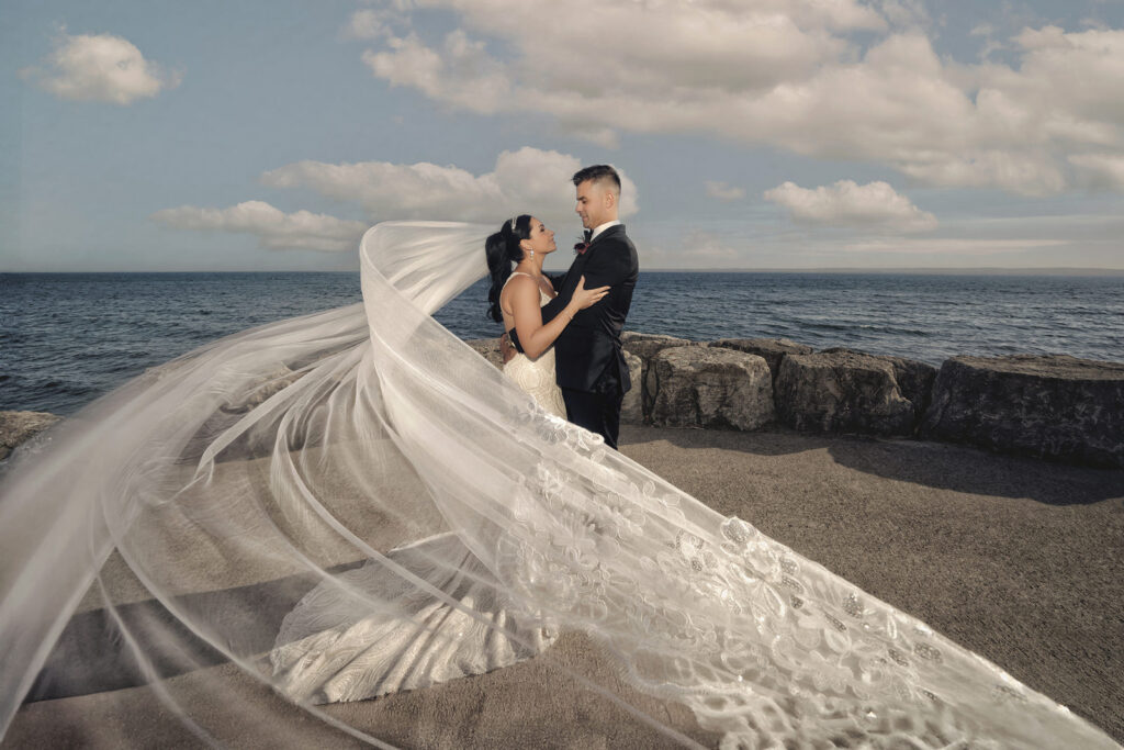 A cinematic wedding portrait for a Spencer's at the Waterfront Wedding couple