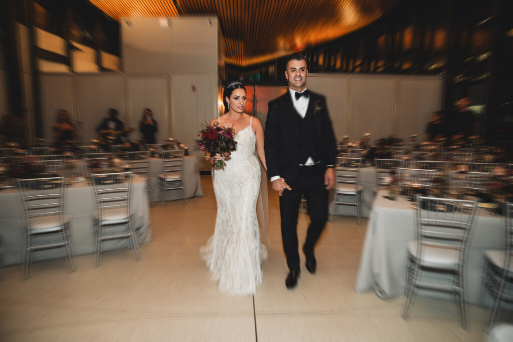 Newlyweds checking out their reception decor at Spencer's at the Waterfront