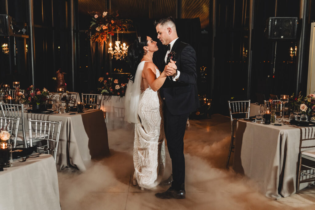 Newlyweds sharing a first dance at Spencer's at the Waterfront