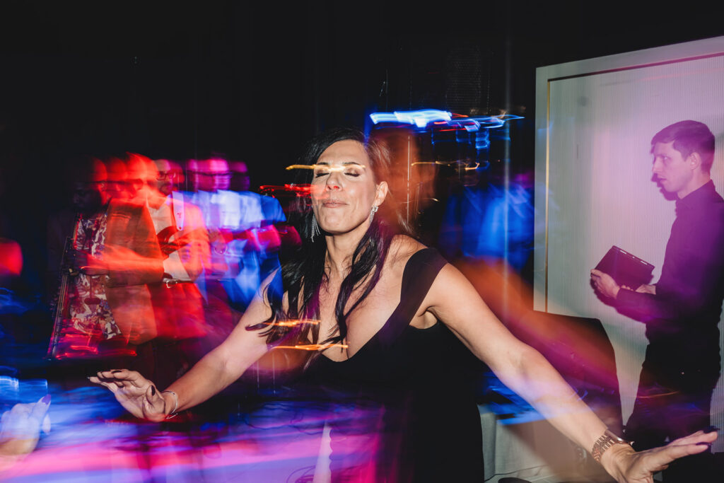 Guests celebrating on the dance floor at a Spencer's at the Waterfront wedding